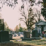 cemetery with single mourner