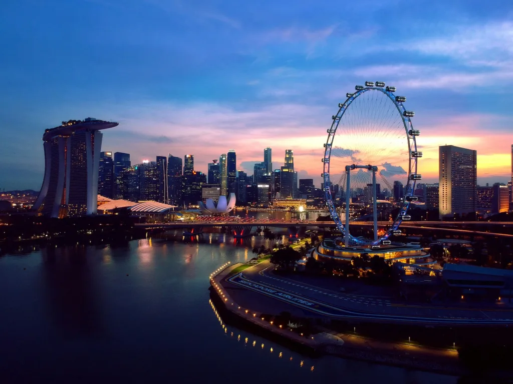 drone shot of city scape at sunset
