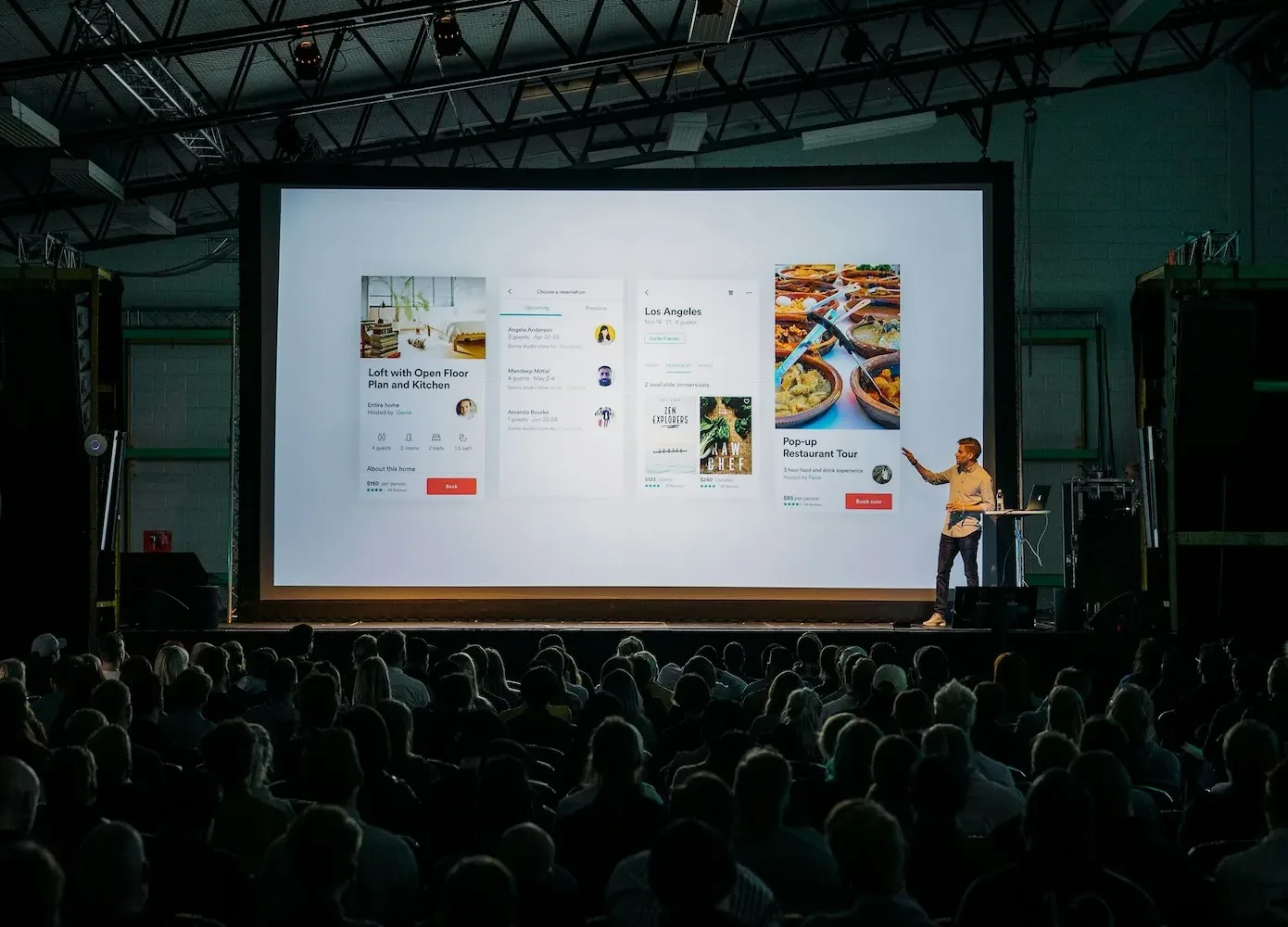 corporate meeting with presenter at large screen